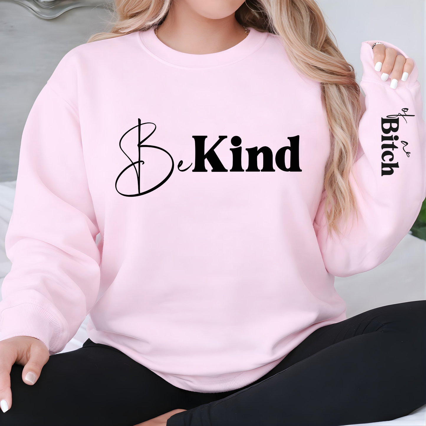 Light pink Be Kind sweatshirt with sleeve design cozy fit