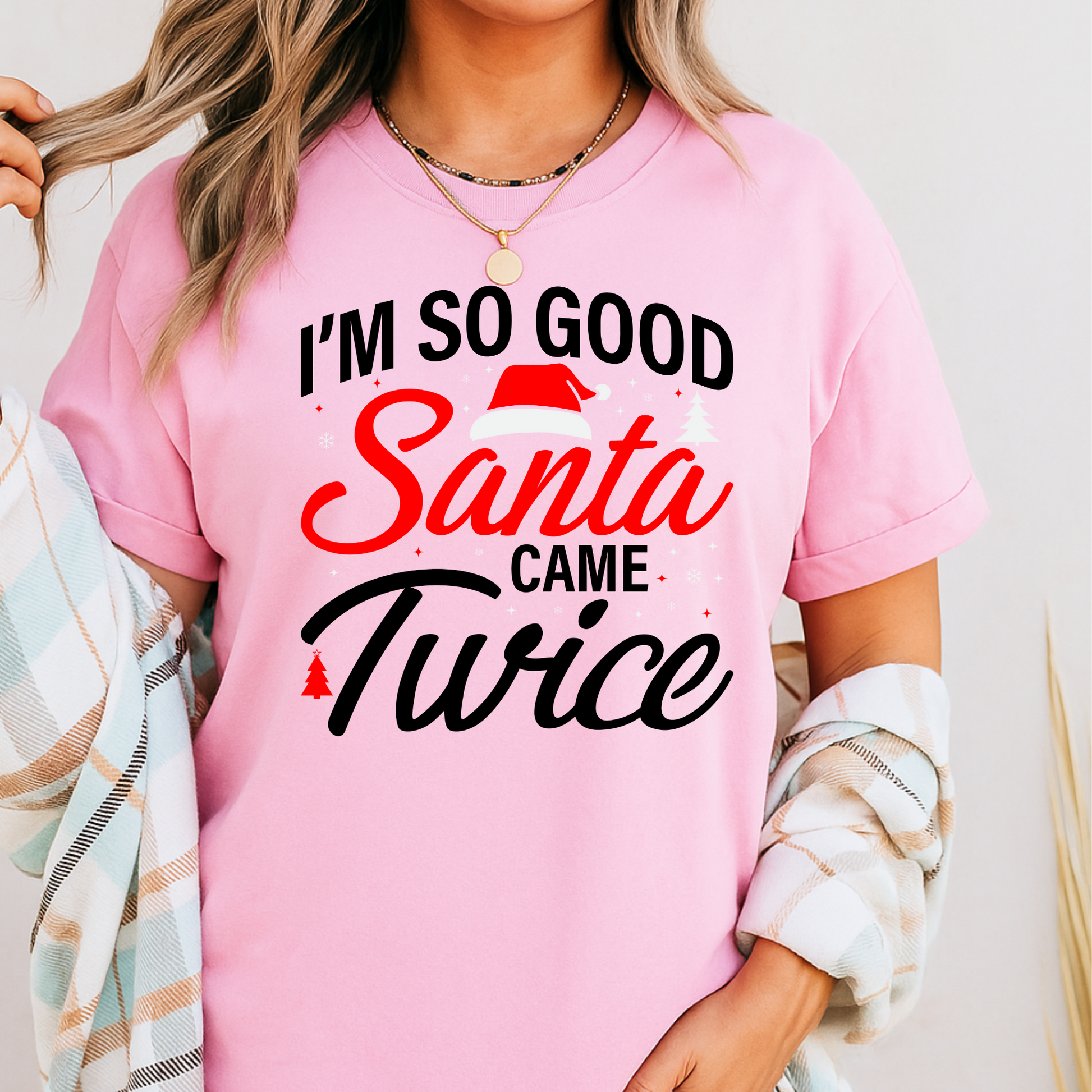 Light pink “I’m So Good Santa Came Twice” women’s Christmas T-shirt, cute and funny holiday party graphic shirt, great gift idea for the season.