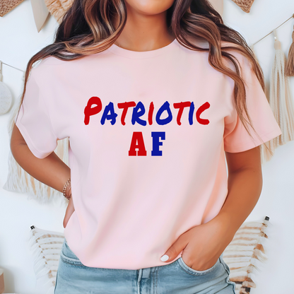 Light pink “Patriotic AF” t-shirt modeled indoors with red and blue patriotic text