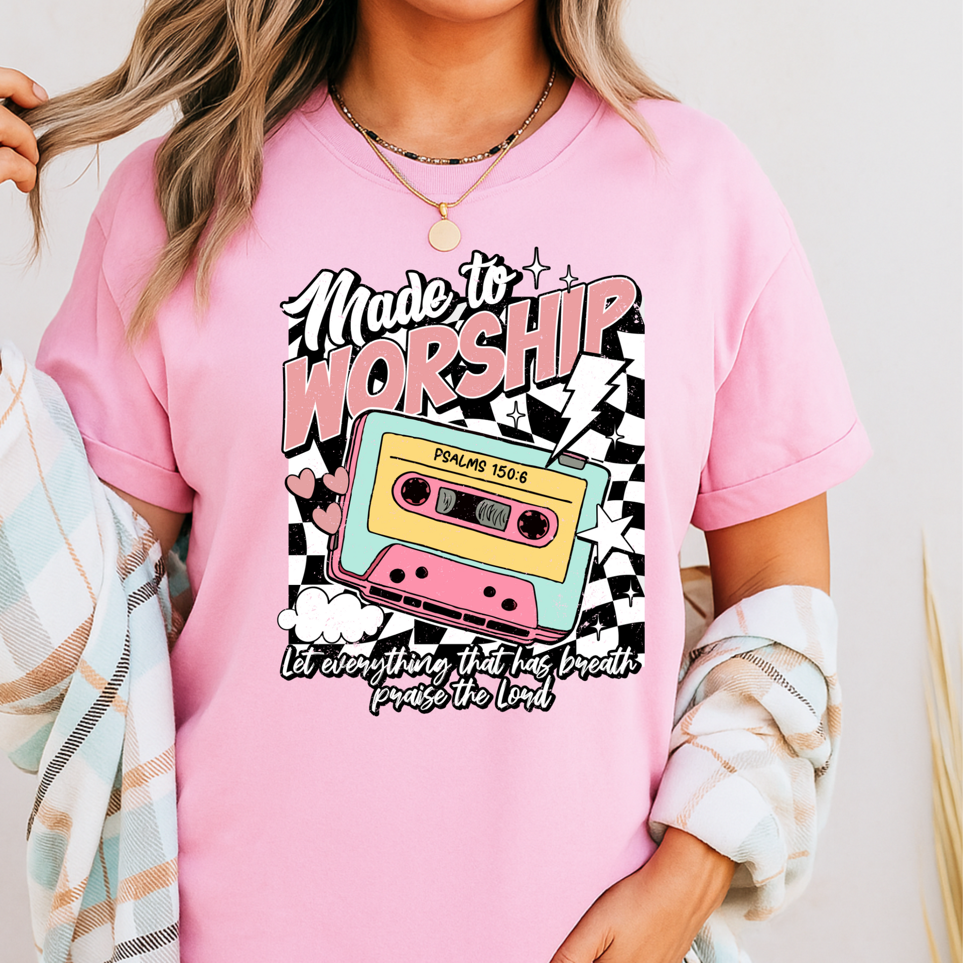 Light pink vintage-style cassette shirt with positive message
