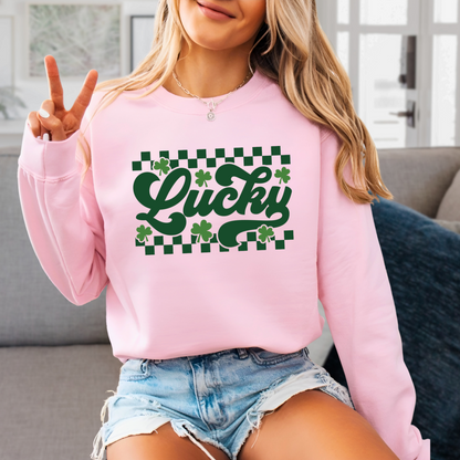 Pink Soft and cozy St. Patrick’s Day sweatshirt with a retro green ‘Lucky’ print, ideal for festive outfits.