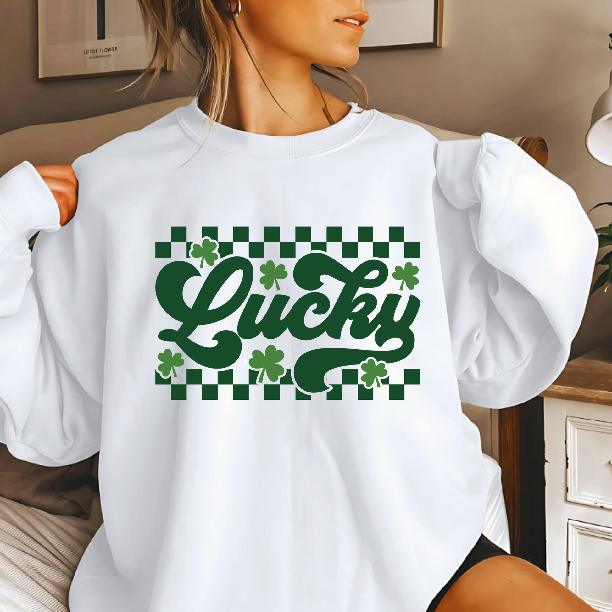 Soft and cozy St. Patrick’s Day sweatshirt with a retro green ‘Lucky’ print, ideal for festive outfits.