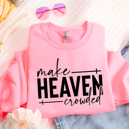 Make Heaven Crowded design on pink sweatshirt flat lay