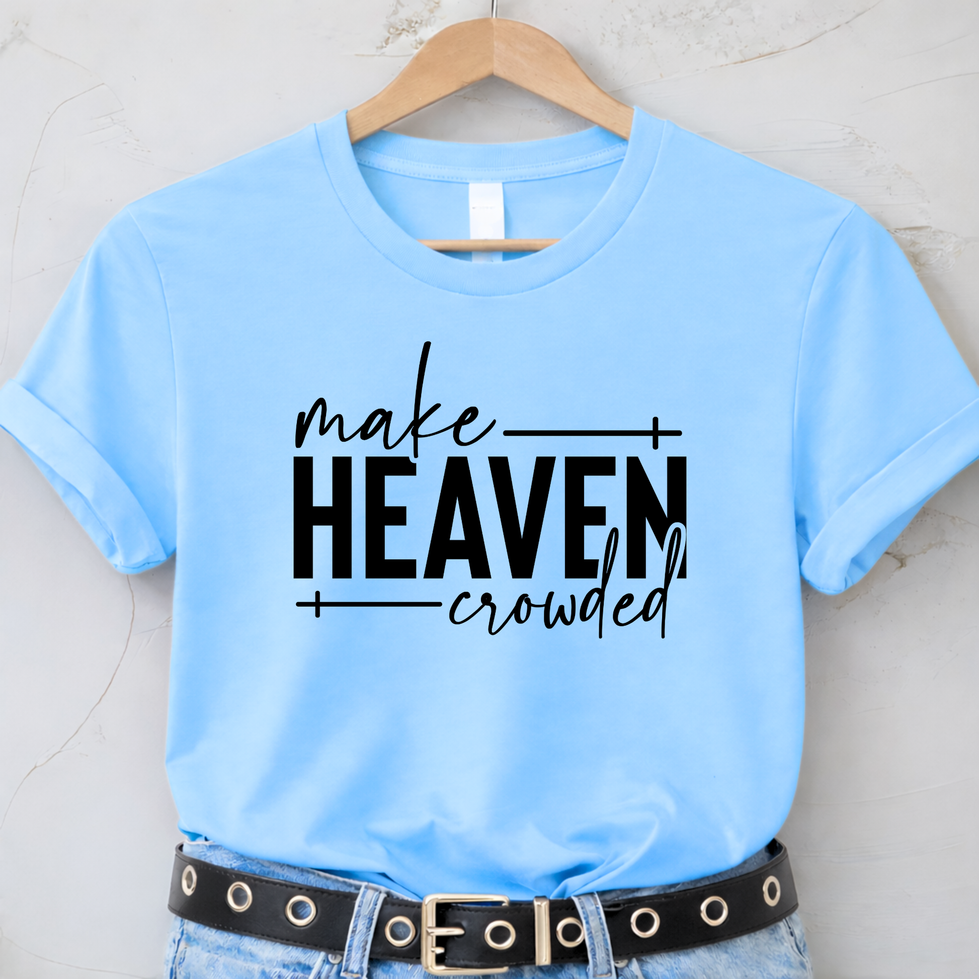 Make Heaven Crowded design on light blue sweatshirt on hanger