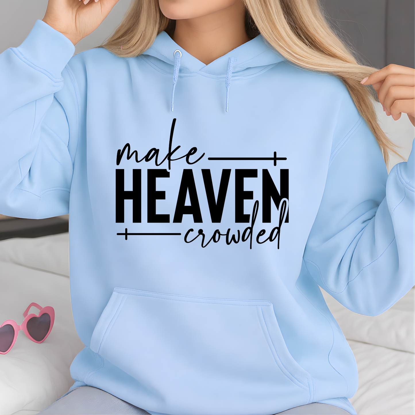 Make Heaven Crowded design on light blue sweatshirt flat lay