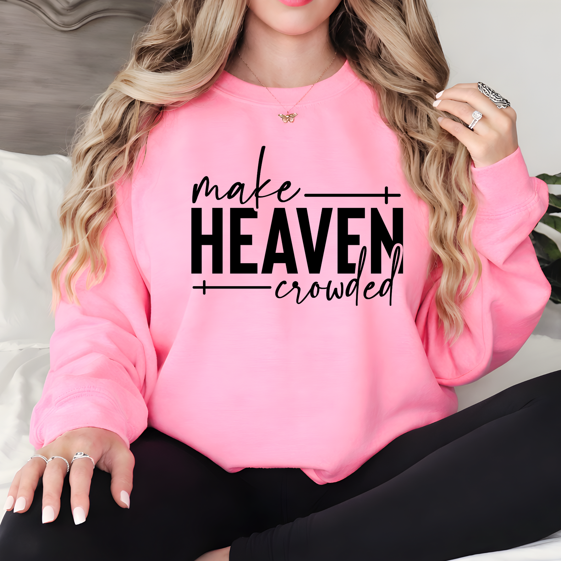 Make Heaven Crowded design on light blue sweatshirt on hanger