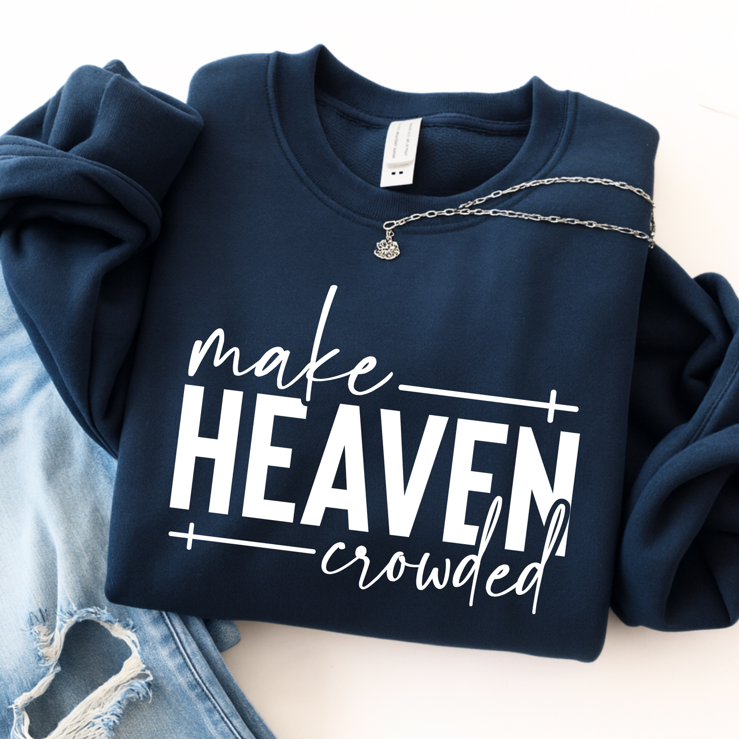 Make Heaven Crowded design on black sweatshirt flat lay