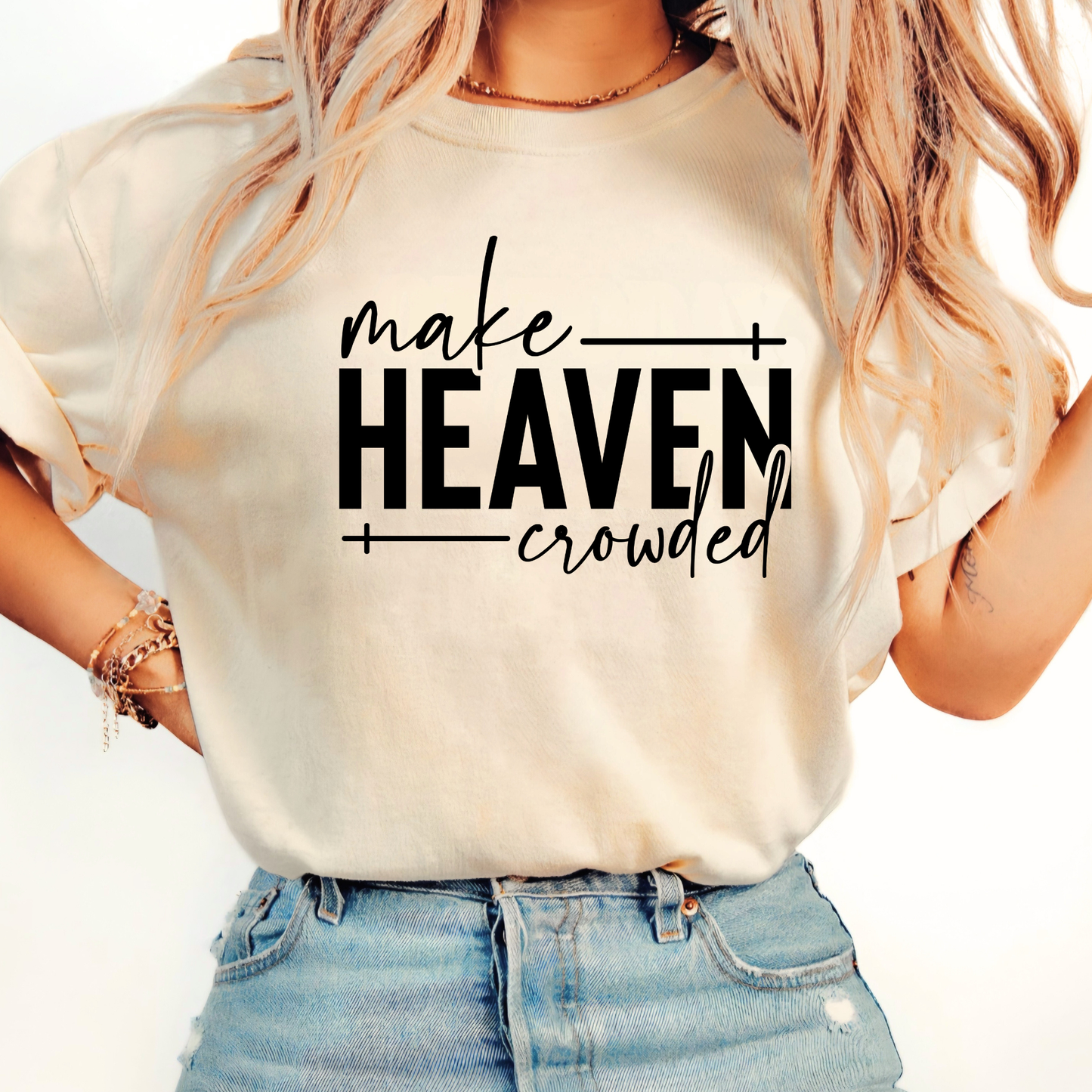 Make Heaven Crowded design on cream sweatshirt flat lay
