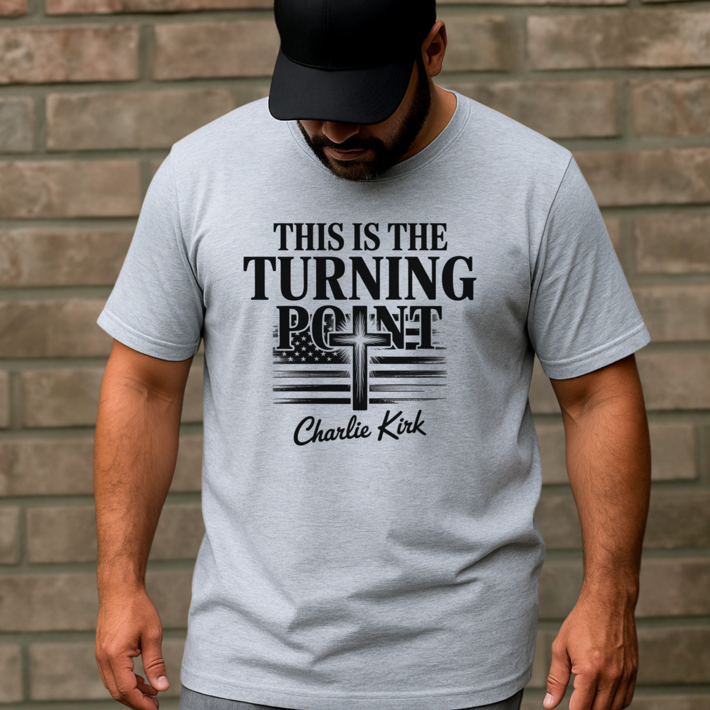 Man wearing athletic gray T-shirt with “This Is the Turning Point” cross and distressed American flag graphic