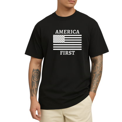Man wearing black America First t-shirt with bold white American flag graphic and patriotic message