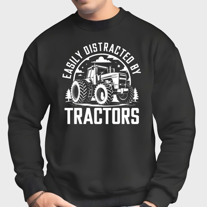 Man wearing black Easily Distracted by Tractors sweatshirt