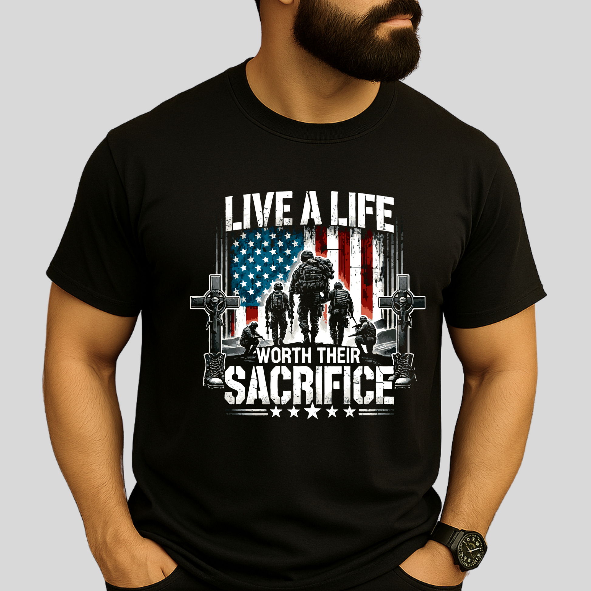 Man wearing black Live a Life Worth Their Sacrifice t-shirt with patriotic soldier and flag graphic