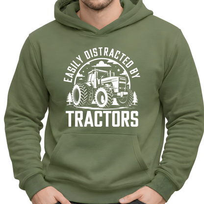 Man wearing military green Easily Distracted by Tractors hoodie