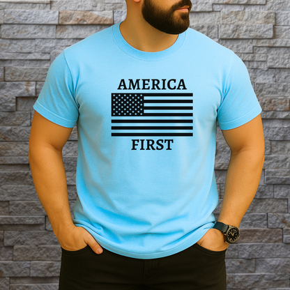 Man wearing sky blue America First t-shirt with black American flag and text graphic