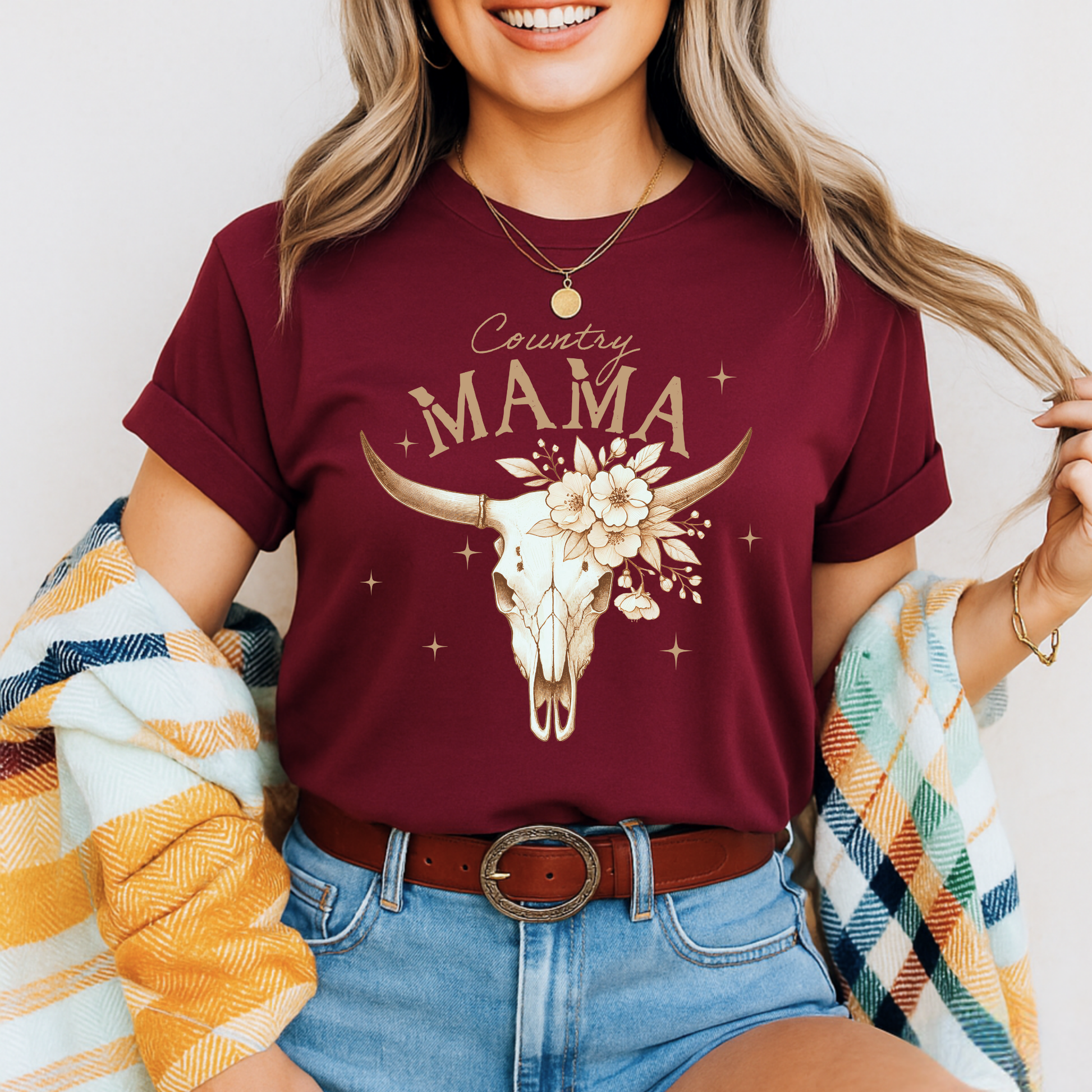 Woman smiling in burgundy "Country Mama" shirt with flannel – styled for fall

