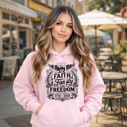 Woman wearing a pink hoodie with text in an outdoor setting