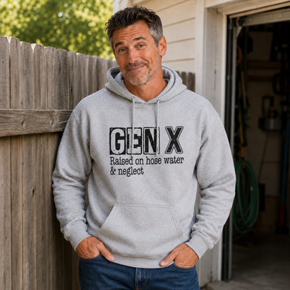 Man wearing a sports gray Gen X hoodie with distressed “Raised on hose water & neglect” lettering near a garage.