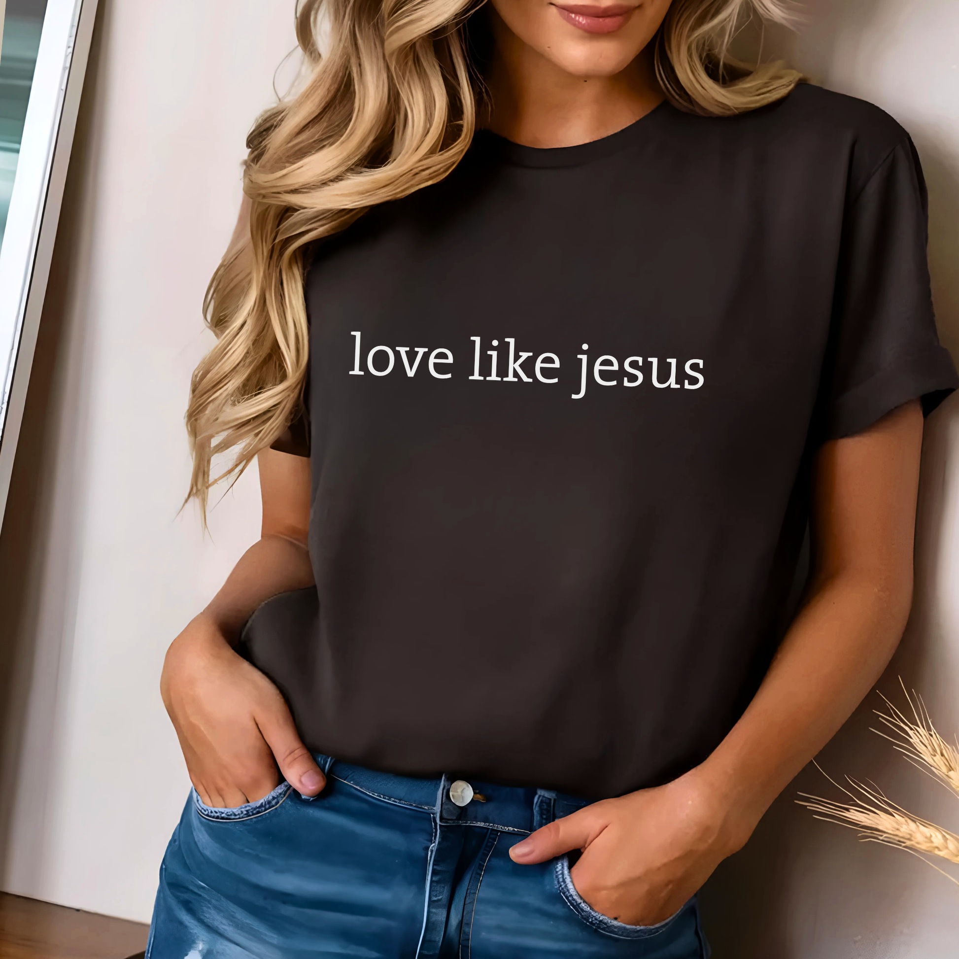 Woman in brown “Love Like Jesus” faith T-shirt, casual modern look
