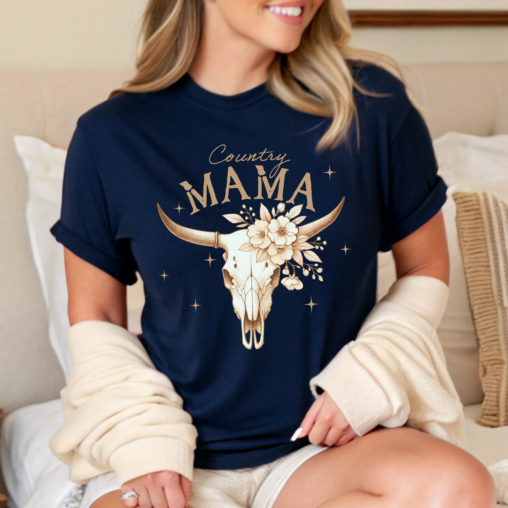 Woman lounging in navy "Country Mama" shirt with cardigan – cozy, casual look

