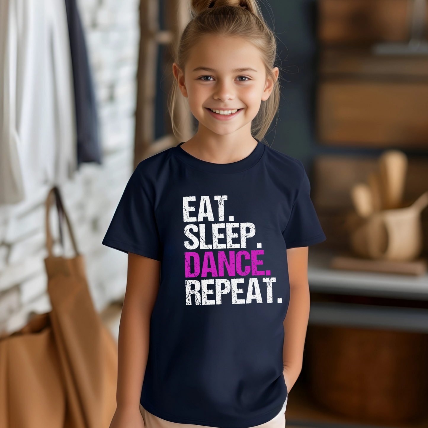 Dance all day in this trendy ‘Eat. Sleep. Dance. Repeat.’ T-shirt! Made for comfort and style, this tee is perfect for hip-hop, ballet, and jazz dancers. A must-have for any dance lover!