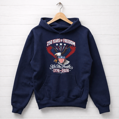 Navy blue America 250 hoodie with an eagle and American flag design on a white wooden background