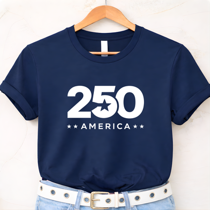 Navy blue t-shirt with '250 America' print on a hanger against a white background