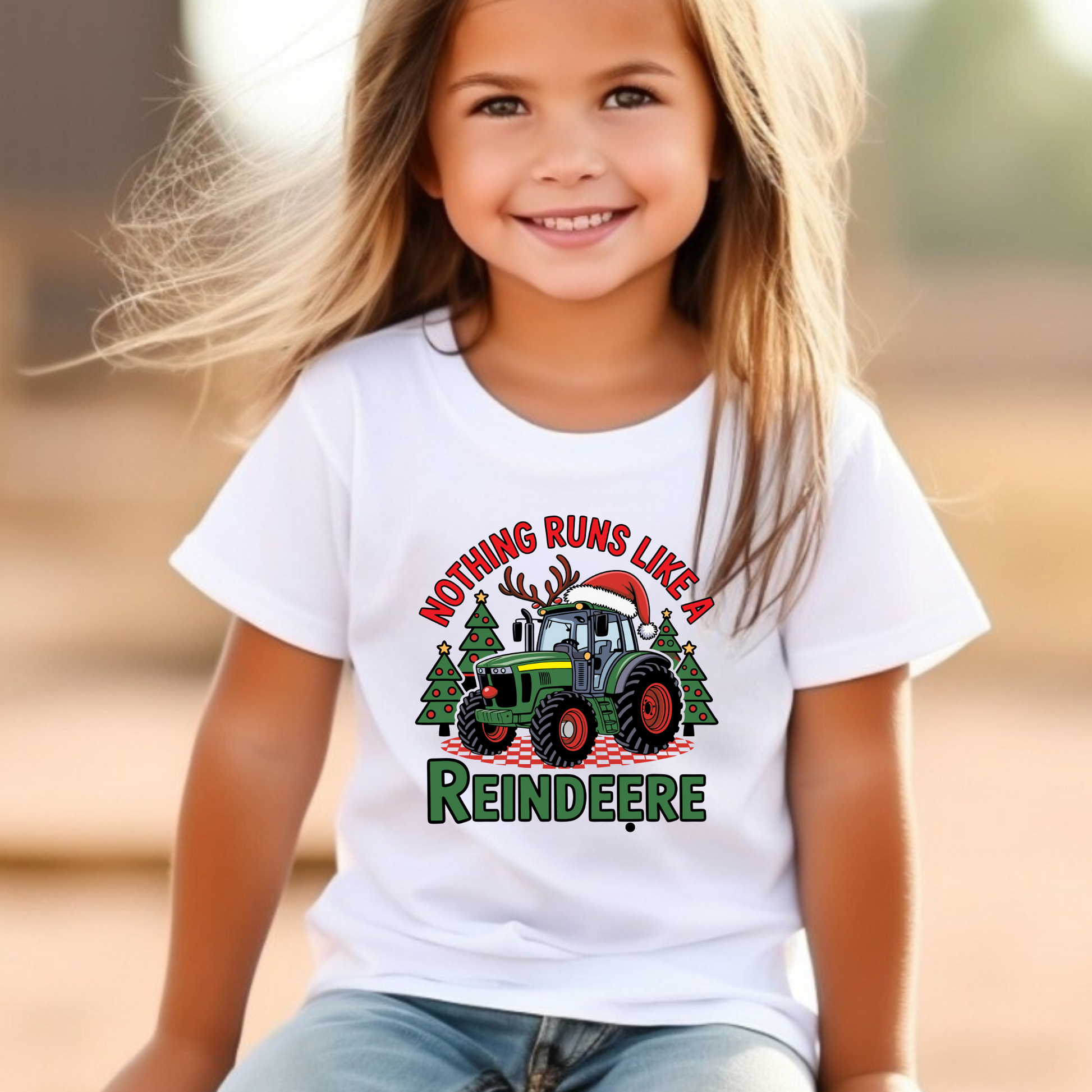 White youth Christmas tractor shirt with funny “Nothing Runs Like a Reindeere” print. Perfect Christmas gift tee for boys and girls.