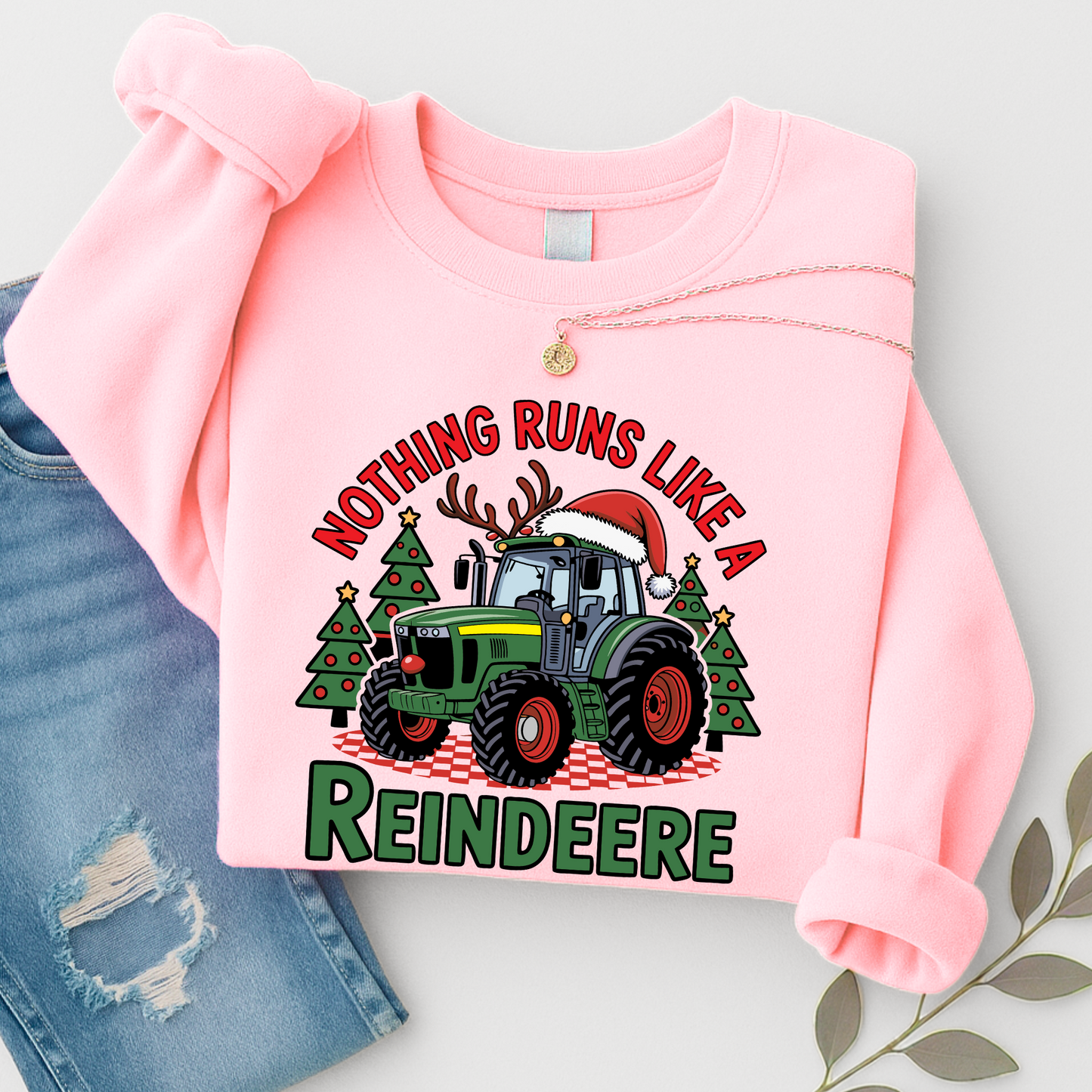 Pink women’s Christmas tractor sweatshirt with festive “Reindeere” design. Cute country holiday sweater gift for wives, moms, and daughters.