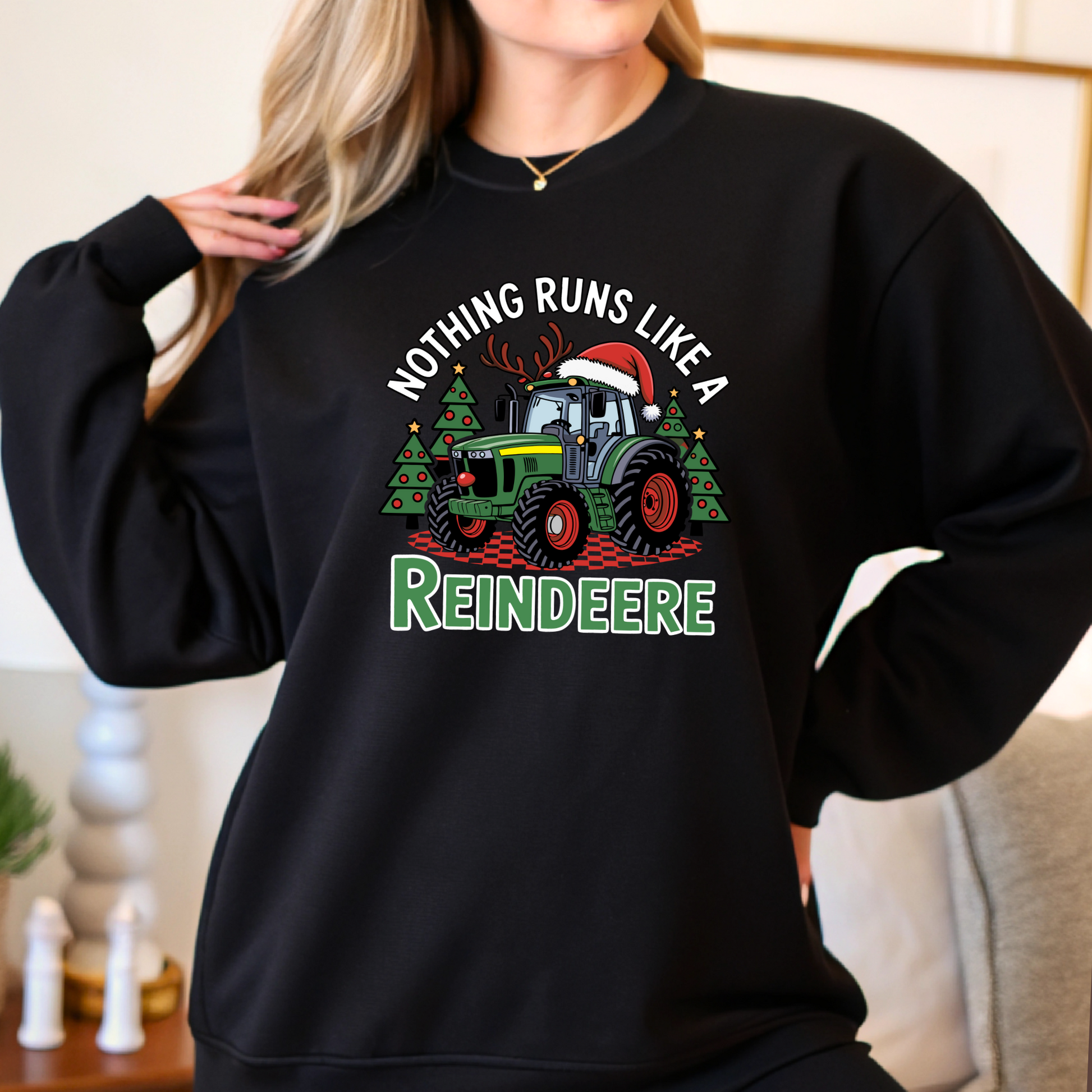 Black festive tractor sweatshirt for women with “Nothing Runs Like a Reindeere” print. Cozy holiday sweater perfect for farm girls and country Christmas outfits.