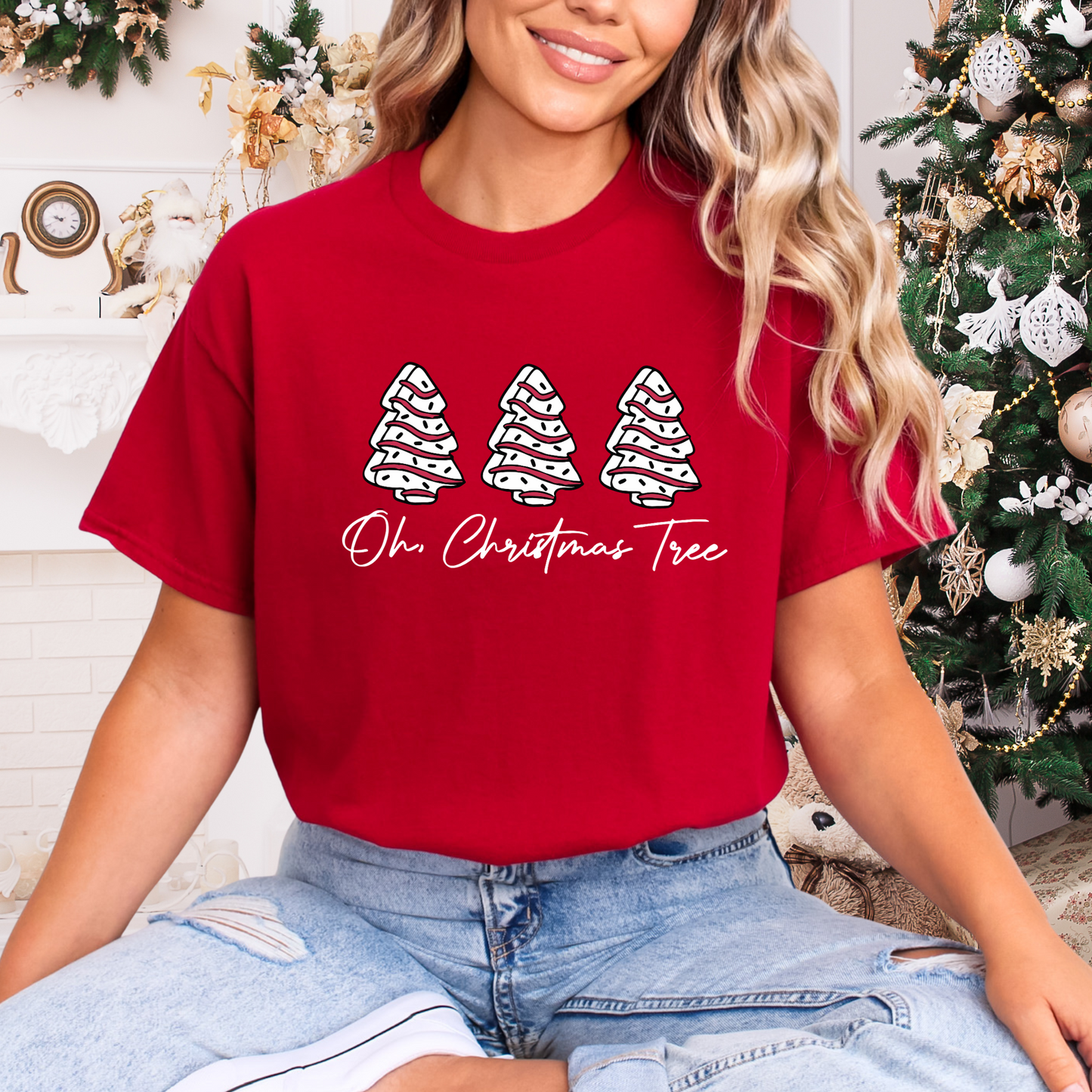  Woman wearing a “Oh Christmas Tree” Christmas womeRedn’s unisex graphic tee with holiday tree design – festive holiday outfit perfect for casual winter style.