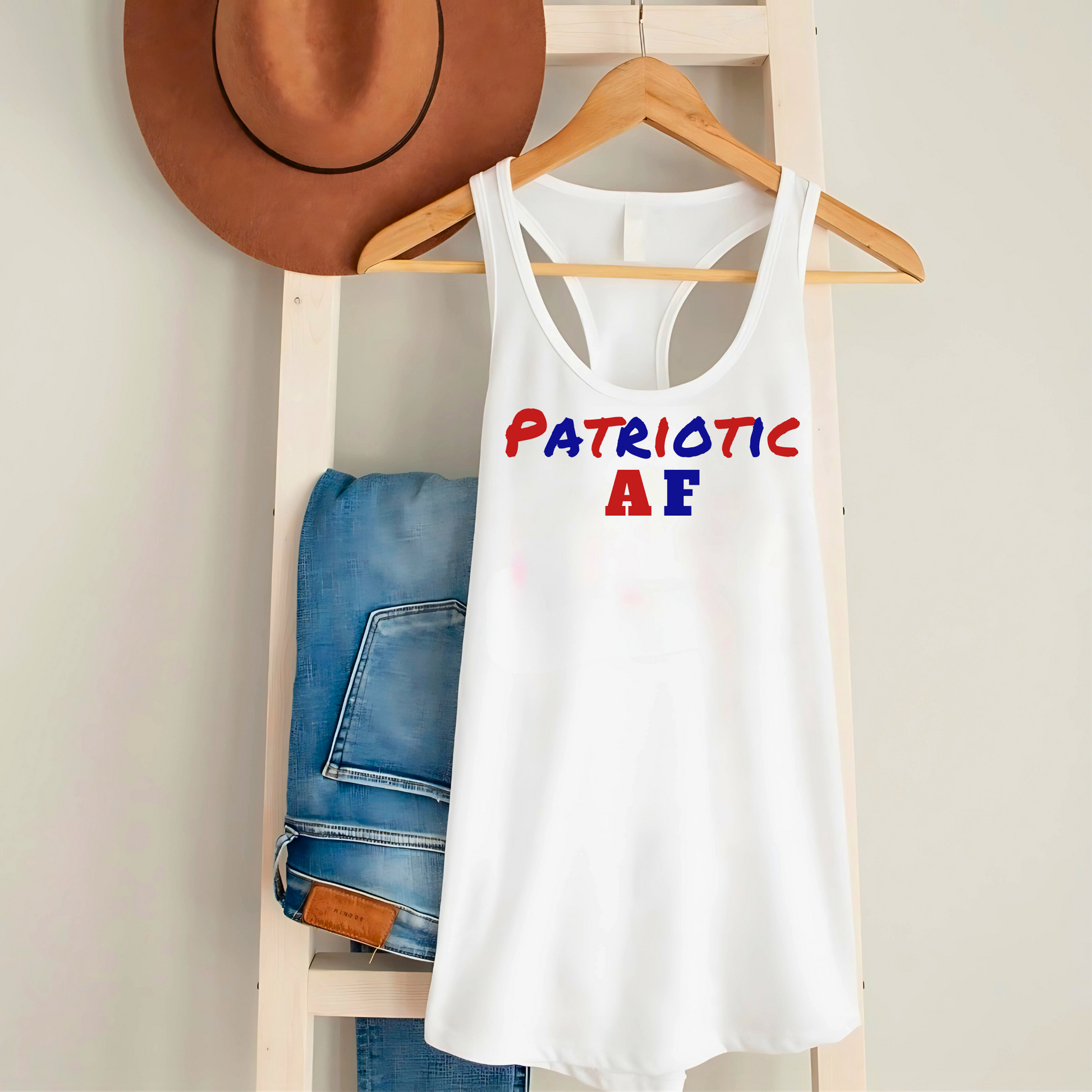 Patriotic AF tank on hanger with jeans and cowboy hat