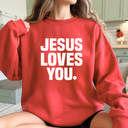 Person wearing a red sweatshirt with 'Jesus Loves You' text in a kitchen setting