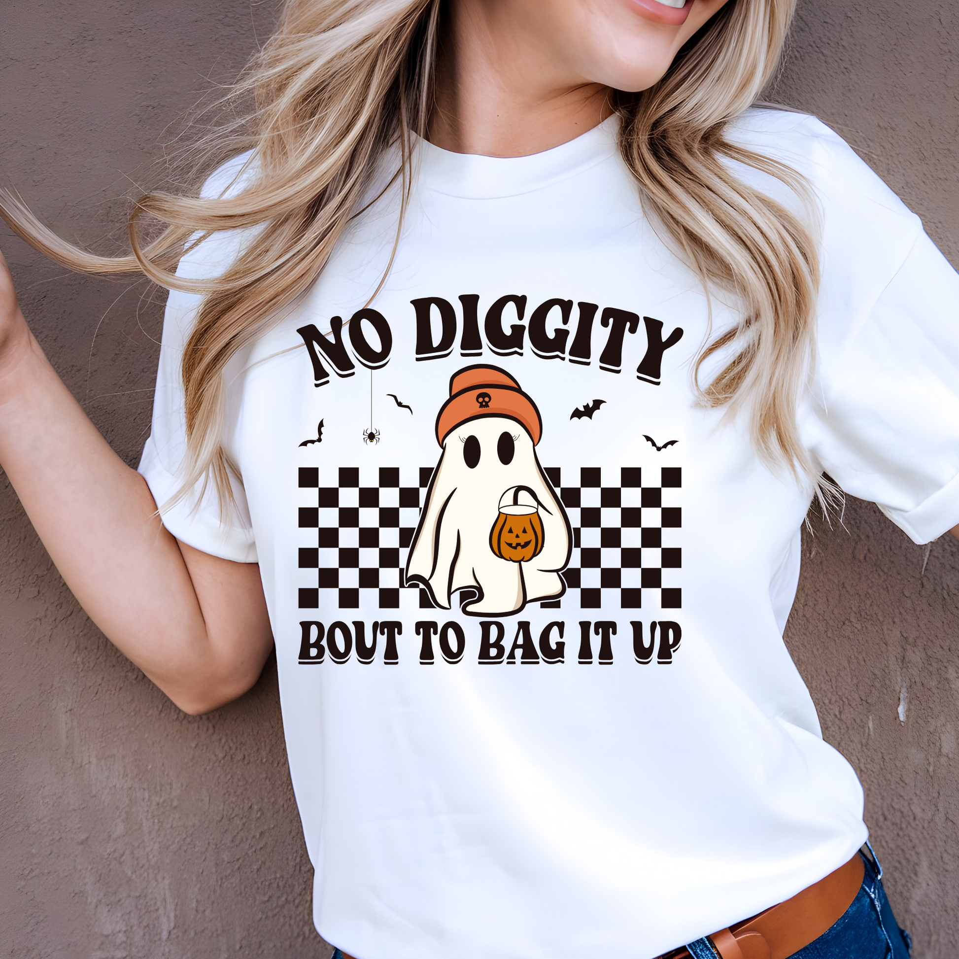 Person wearing a white t-shirt with a Halloween-themed graphic and text.