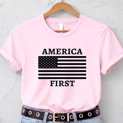Light pink patriotic women's unisex t-shirt with American flag graphic on hanger – America 250 anniversary shirt.