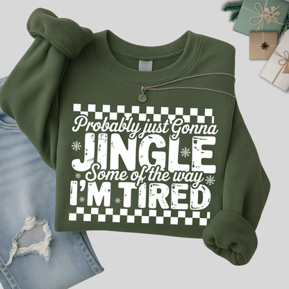 Green sweatshirt folded with holiday design