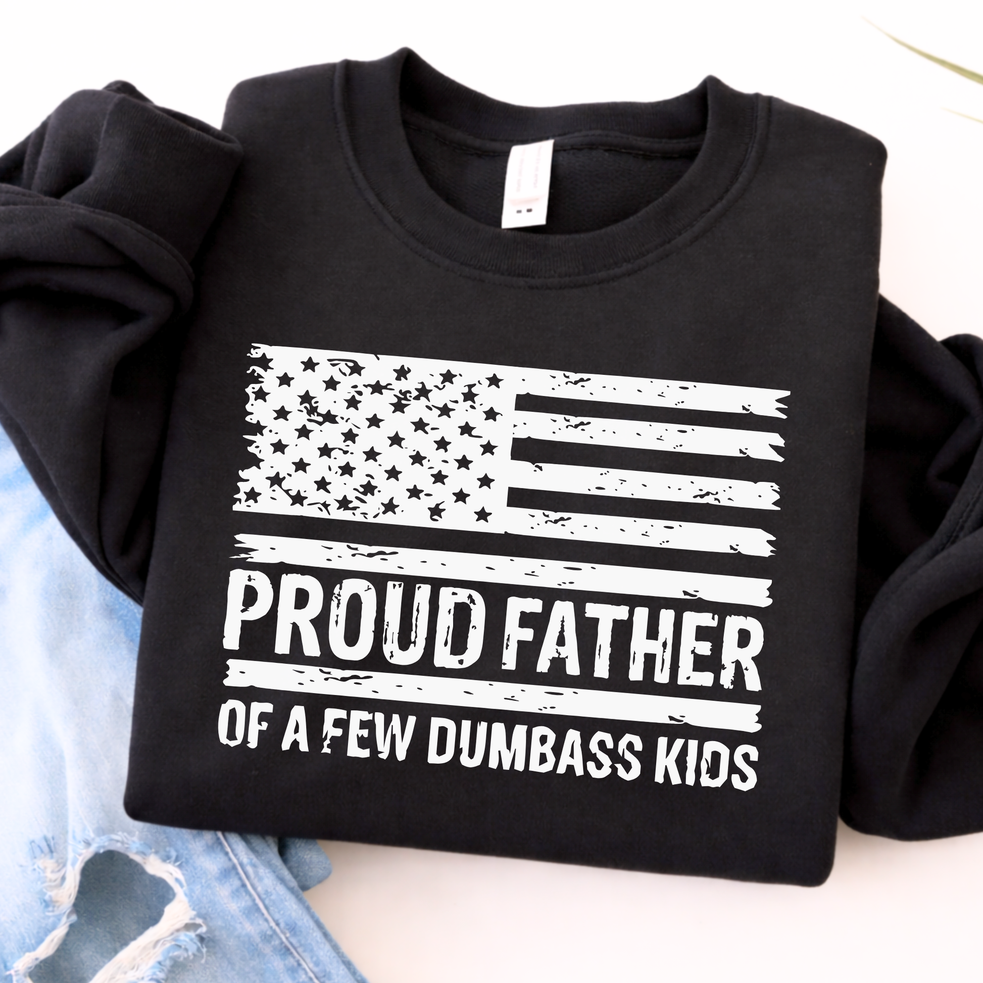 Black sweatshirt with American flag design and text on a white background