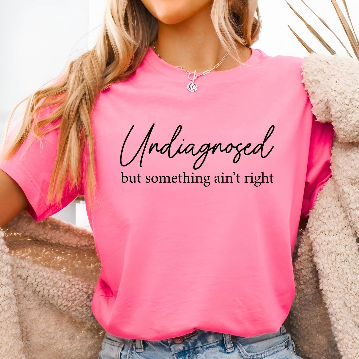 Safety pink tee styled open with cozy jacket

