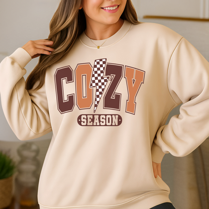 Sand colored Cozy Season sweatshirt styled for autumn indoors