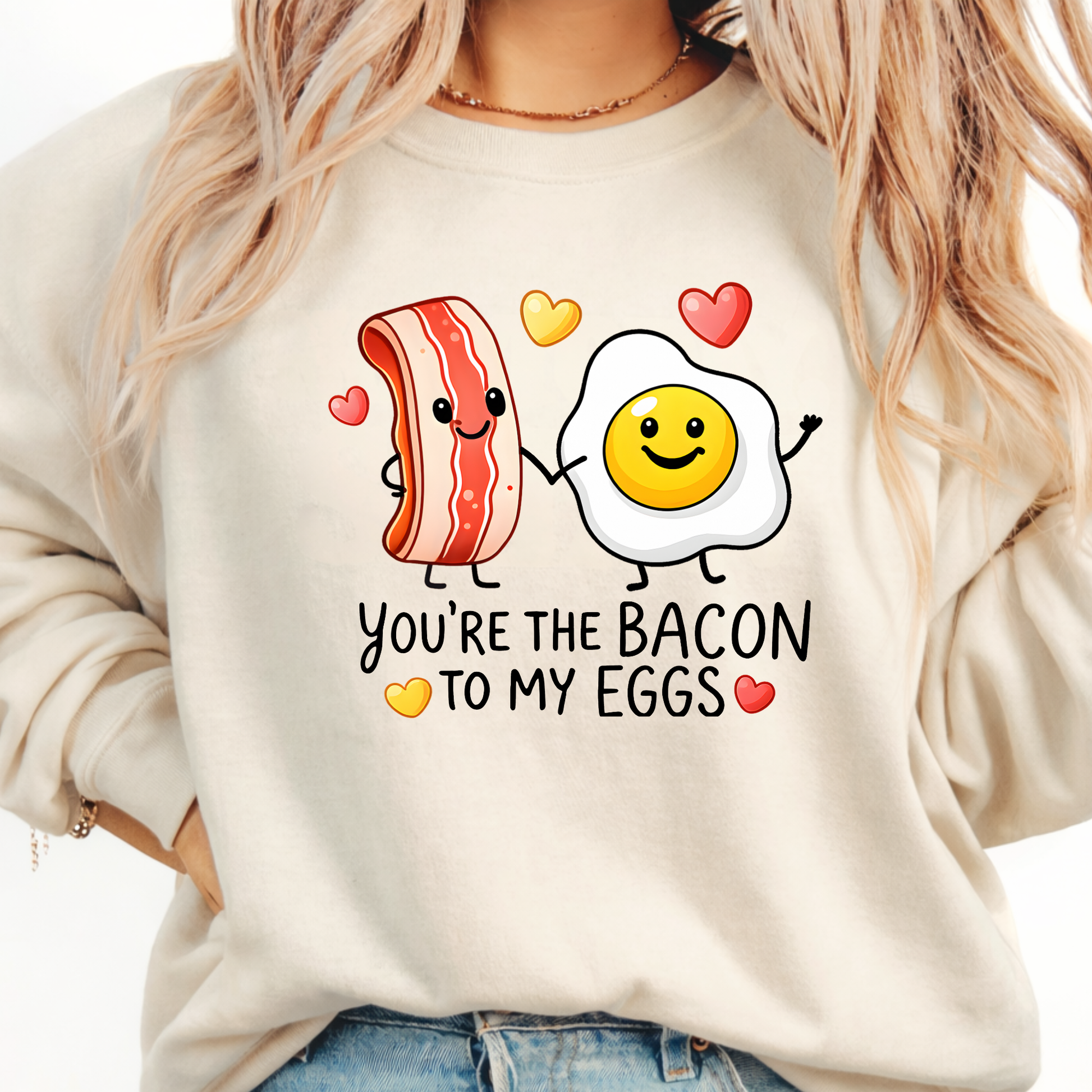 Sand valentine sweatshirt featuring you’re the bacon to my eggs playful bacon and egg love design