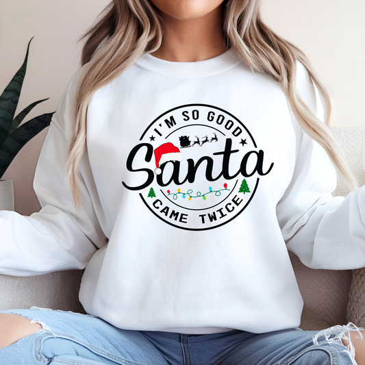 Woman wearing white Christmas sweatshirt – I’m So Good Santa Came Twice design