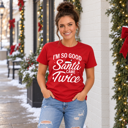 Woman modeling a red T-shirt with the I'm So Good Santa Came Twice Christmas graphic.
