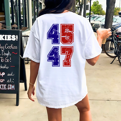 Person wearing a white t-shirt with red and blue numbers on the back, standing outdoors.