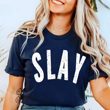 Woman wearing a navy blue t-shirt with 'SLAY' printed in white.