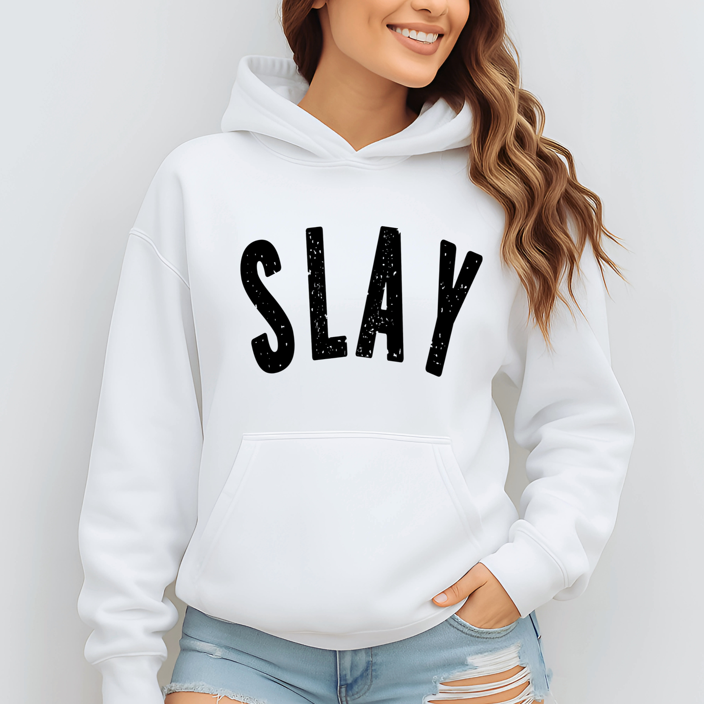 Teen wearing a Slay hoodie unisex fit front view
