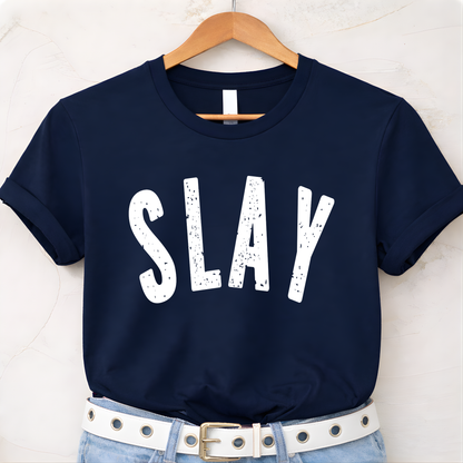 Navy blue t-shirt with 'SLAY' text on a hanger against a white background