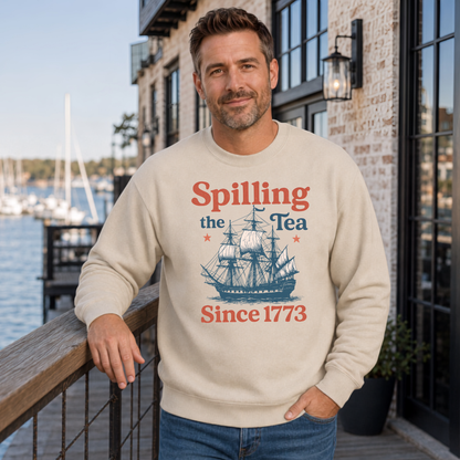Sand crewneck sweatshirt featuring the Spilling the Tea Since 1773 vintage ship graphic.