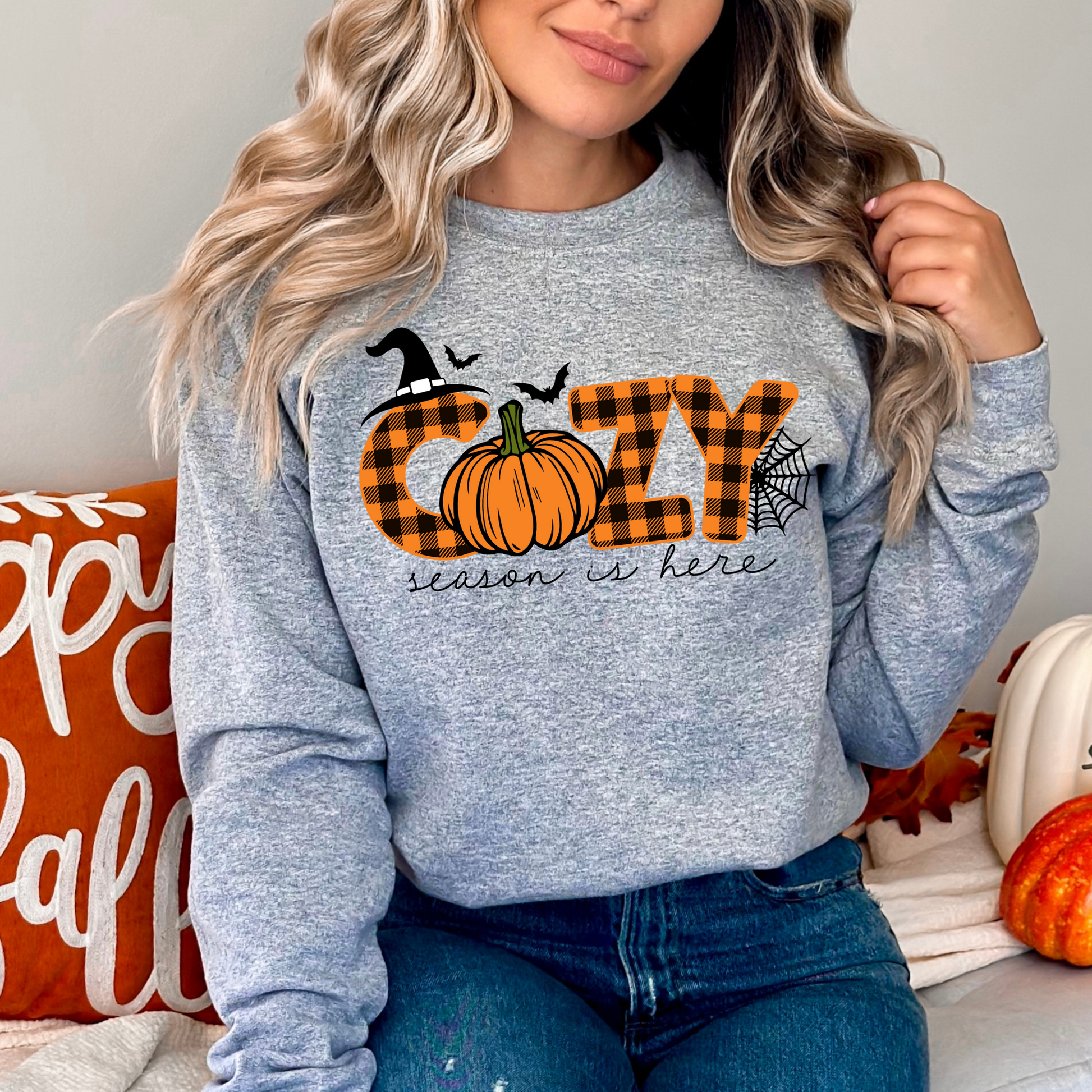 Sports gray sweatshirt with cozy fall graphic, perfect for lounging or decorating
