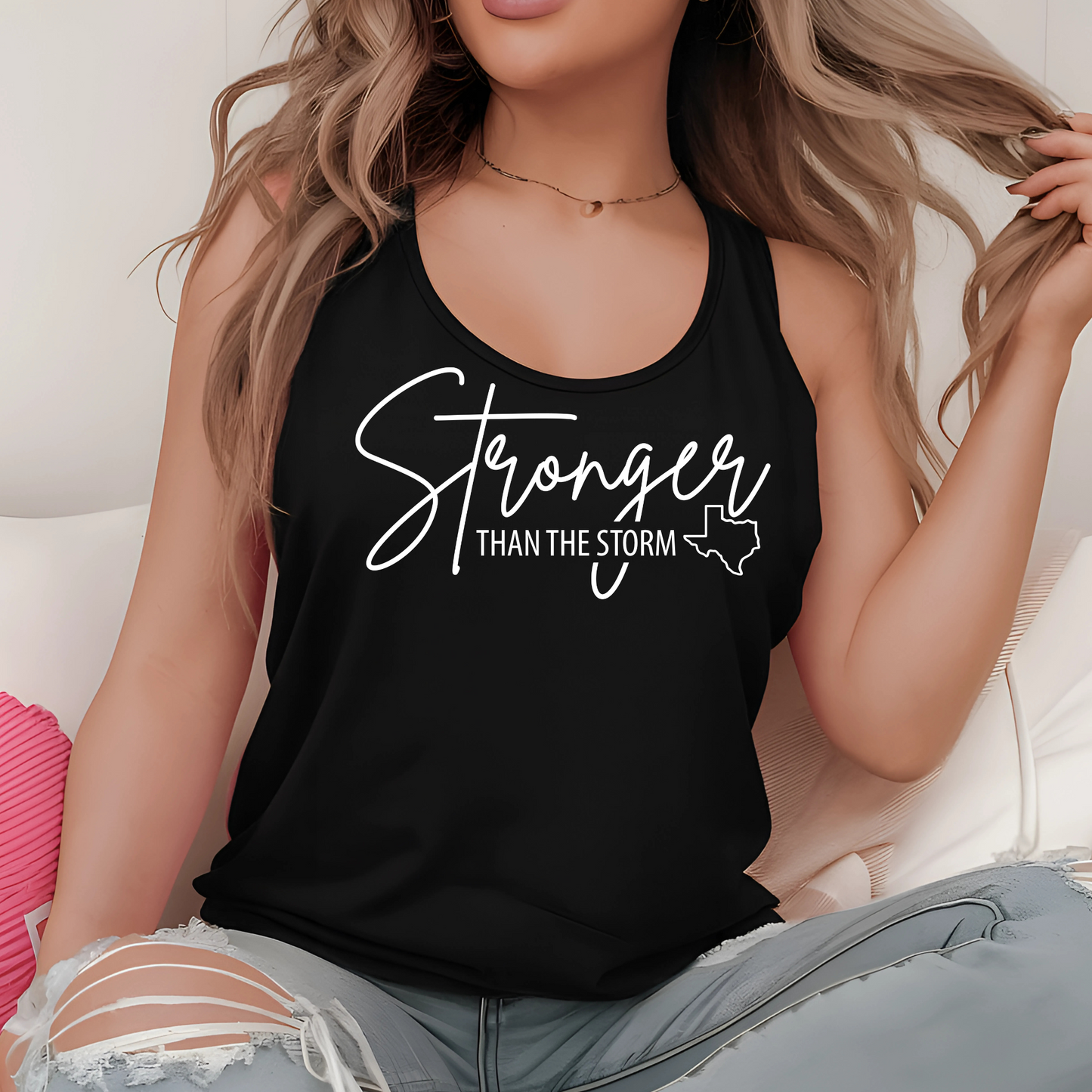 Woman wearing a black tank top with 'Stronger Than The Storm' text Texas flood relief Tank