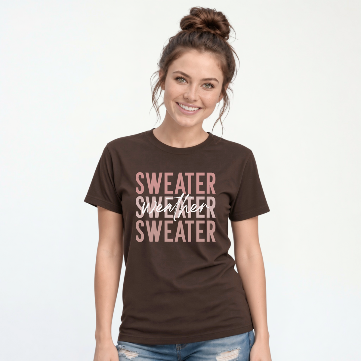 Woman wearing brown Sweater Weather T-shirt with jeans