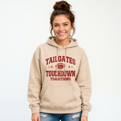 Sand pullover hoodie with the red Tailgates & Touchdown Traditions football design modeled against a white background.